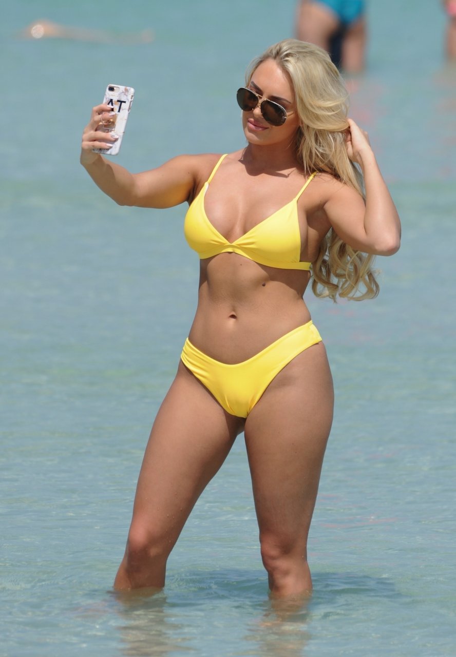 Amber Turner Shows Off Her Assets On The Beach 27 Photos