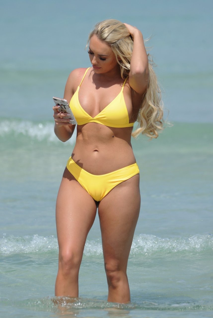 Amber Turner Shows Off Her Assets On The Beach 27 Photos