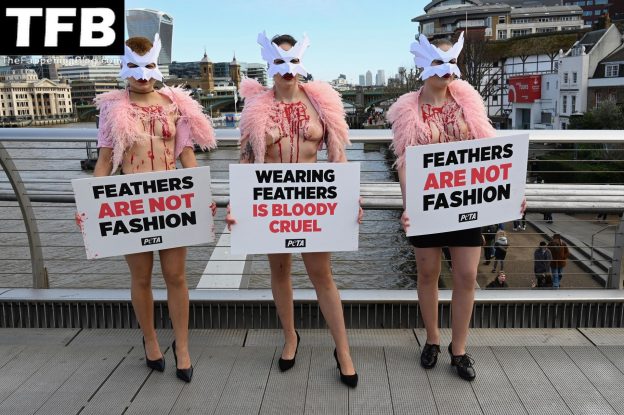 Peta Topless Protest At Use Of Feathers In The Fashion Industry