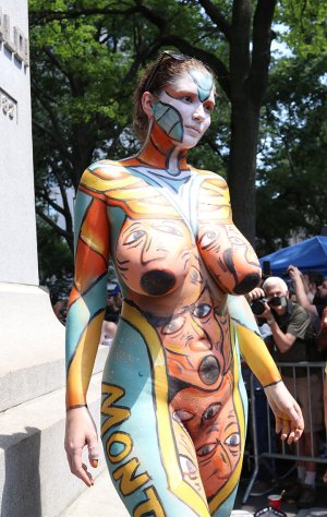 586875-big-breasted-beauty-nude-in-public-at-bodypainting.jpg