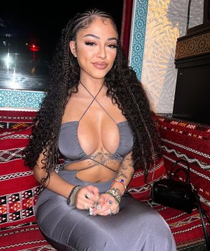 Malu_Trevejo_Cleavage_in_a_grey_dress_11-26-2023__3_.jpg
