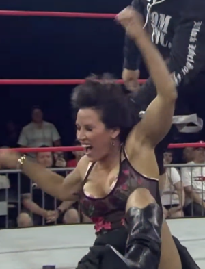 mickie old TNA nipslip.png
