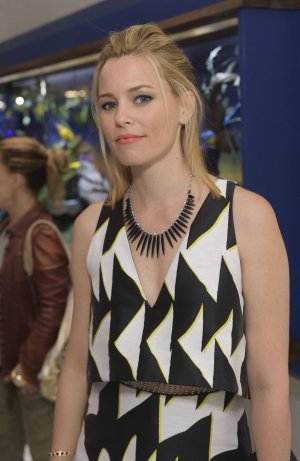 elizabeth-banks-in-mini-dress-at-irene-neuwirth-flagship-grand-opening-in-west-hollywood_3.jpg