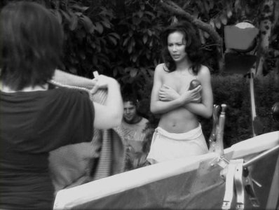 Lexa Doig - Shooting of Women of Sci-Fi Calendar 2007 (handbra-cleavage-nipslip) _000239238.jpg