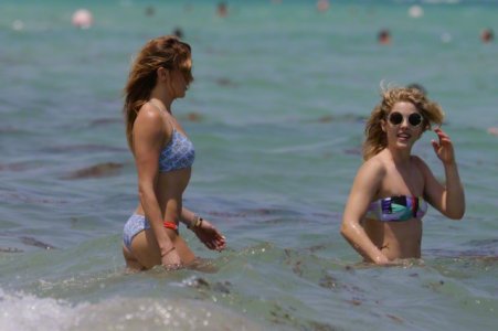 Katie Cassidy & Emily Bett Rickards - at a beach in Miami ebr (12).jpg