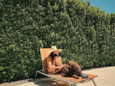 Meaghan Rath - sitting with her dog 157865954_meaghan.jpg