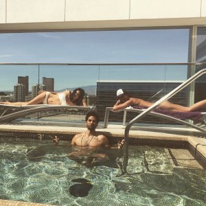 Emmanuelle Chriqui & Jenna Dewan Tatum - laying by a pool JE.jpg