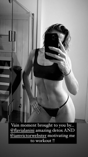 Shantel VanSanten - taking a selfie in a mirror.jpg