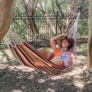 Odette Annable Yustman - laying in a hammock.jpg