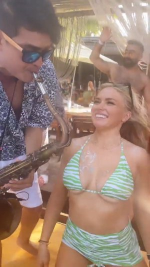 Natalie Alyn Lind - green striped bikini top 4.jpg