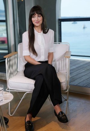 dakota-johnson-at-kering-women-in-motion-talk-in-cannes-05-19-2025-1.jpg