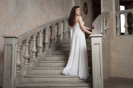 tempting-brunette-in-beautiful-white-dress-showcasing-her-hairy-pussy-on-the-sofa-01 thefappen...jpg