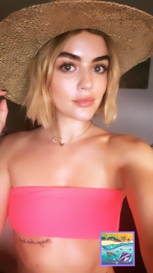 Lucy Hale - wearing a tube top 94539758_lucy.jpg