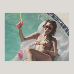 Olivia Thirlby - wearing a bikini top in a pool ot.jpg
