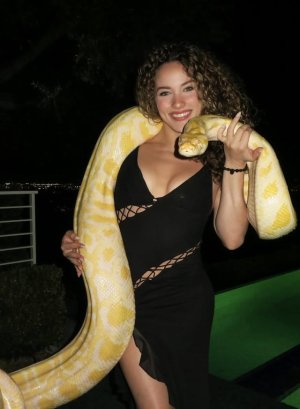 posing-with-snakes-v0-rwjows6pshff1.jpg