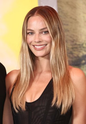 margot-robbie-unveils-sheer-stella-mccartney-at-la-photocall-10.jpg
