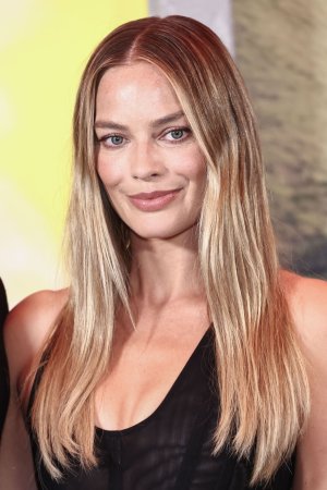 margot-robbie-unveils-sheer-stella-mccartney-at-la-photocall-13.jpg