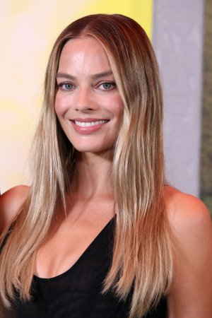 margot-robbie-unveils-sheer-stella-mccartney-at-la-photocall-4.jpg