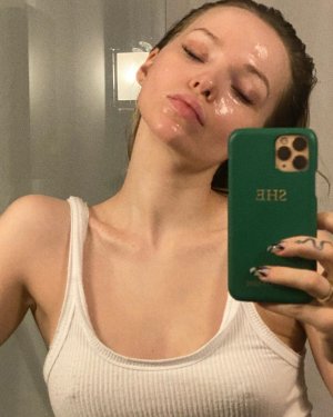 Dove Cameron - wearing a white tank top FeqBdfPk_o.jpg