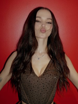 Dove Cameron - wearing brown top & red shorts for her performance in Liverpool 511460857_18512...jpg