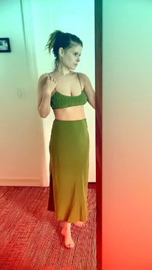 Kate Mara - standing in a hallway.jpg