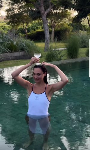 Gal Gadot - in white swimsuit ME162K3Y_o.jpg