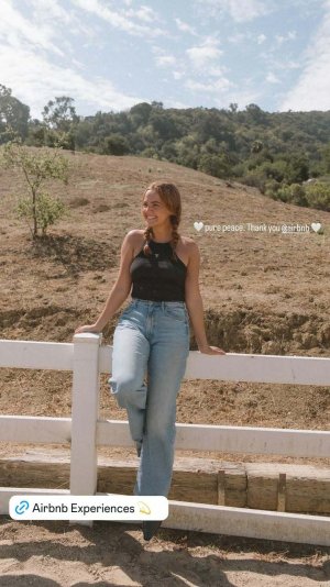 Bailee Madison - black top and jeans ME16FCA9_o.jpg