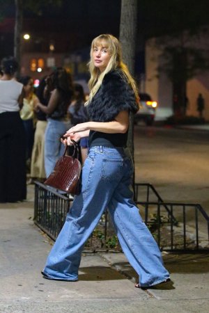 Jennifer Lawrence - looks classy and elegant wearing fur with jeans in New York September 18, ...jpg