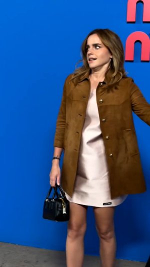 Emma Watson - Leggy in a pale pink mini dress 1.jpg