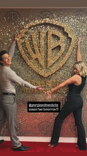 Emily Osment - posing for a photo.jpg