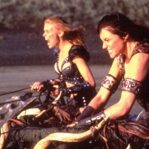 Hudson_Leick--SCANHQ_XenaTheWarriorPrincessMagazine01P01 with Lucy Lawless.jpg
