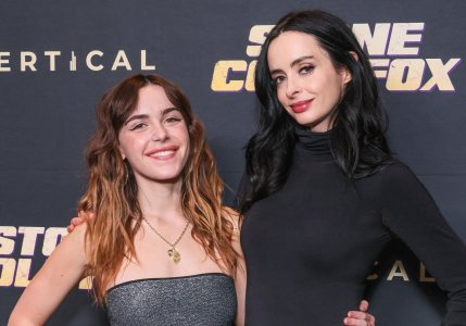 Kiernan Shipka and Krysten Ritter at the Los Angeles premiere of 'Stone Cold Fox' in West Holl...jpg