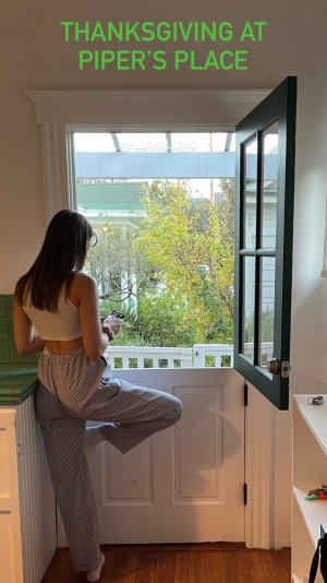 Willa Holland - looking out a door wh.jpg