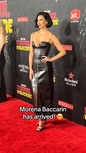 Morena Baccarin in plunging leather dress 5.jpg