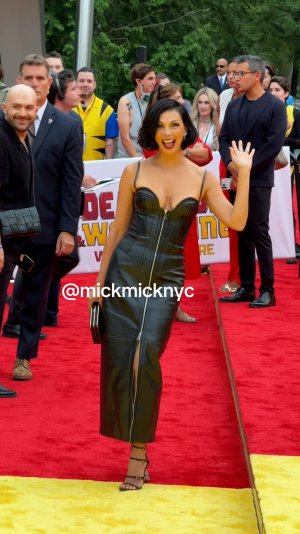 Morena Baccarin in plunging leather dress 6.jpg