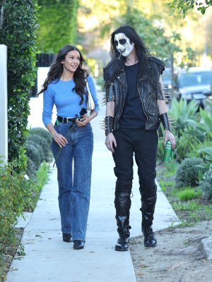 Nina Dobrev on a photoshoot set for e.l.f. Cosmetics x Liquid Death Lip Embalm.jpg