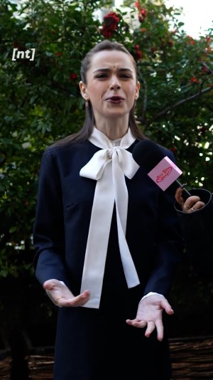 Kiernan Shipka in black mini dress & white socks 13.jpg