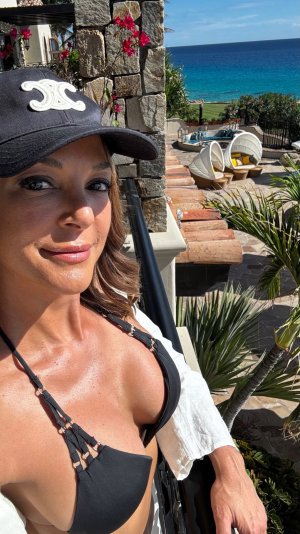 Eva LaRue - bikini top and hat ME19ZGF0_o.jpg