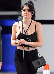 Ariel Winter’s nipple and half of her bulbous breast slip out the side of her Playboy tank top1.jpg