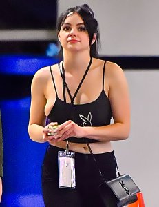 Ariel Winter’s nipple and half of her bulbous breast slip out the side of her Playboy tank top2a.jpg