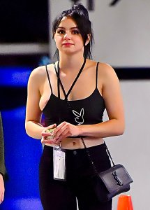 Ariel Winter’s nipple and half of her bulbous breast slip out the side of her Playboy tank top3a.jpg