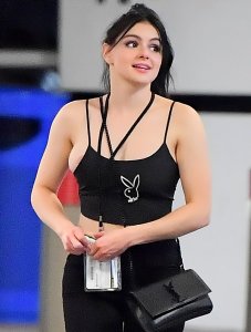 Ariel Winter’s nipple and half of her bulbous breast slip out the side of her Playboy tank top6.jpg