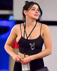 Ariel Winter’s nipple and half of her bulbous breast slip out the side of her Playboy tank top7a.jpg