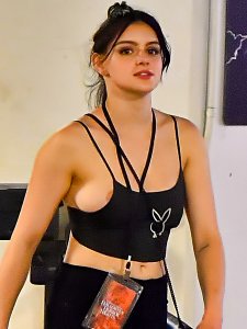 Ariel Winter’s nipple and half of her bulbous breast slip out the side of her Playboy tank top8a.jpg