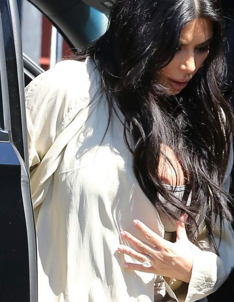 Kim Kardashian Nipple Slip (2 Photos)