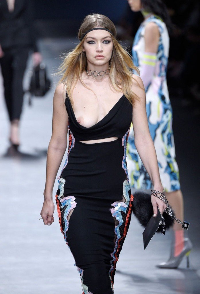 Gigi Hadid walked the runway braless at the Versace fashion show in Milan, ...