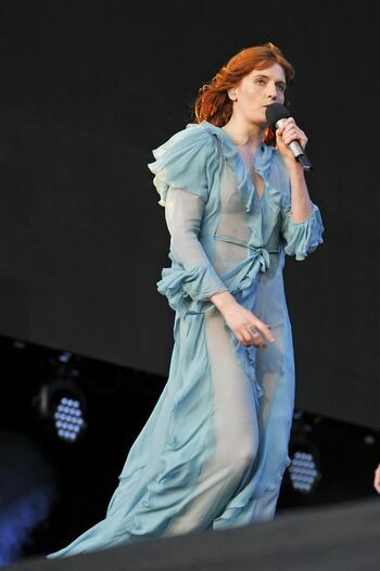 Florence Welch flashes pokies in a see-thru bra at British Summer Time Fest...