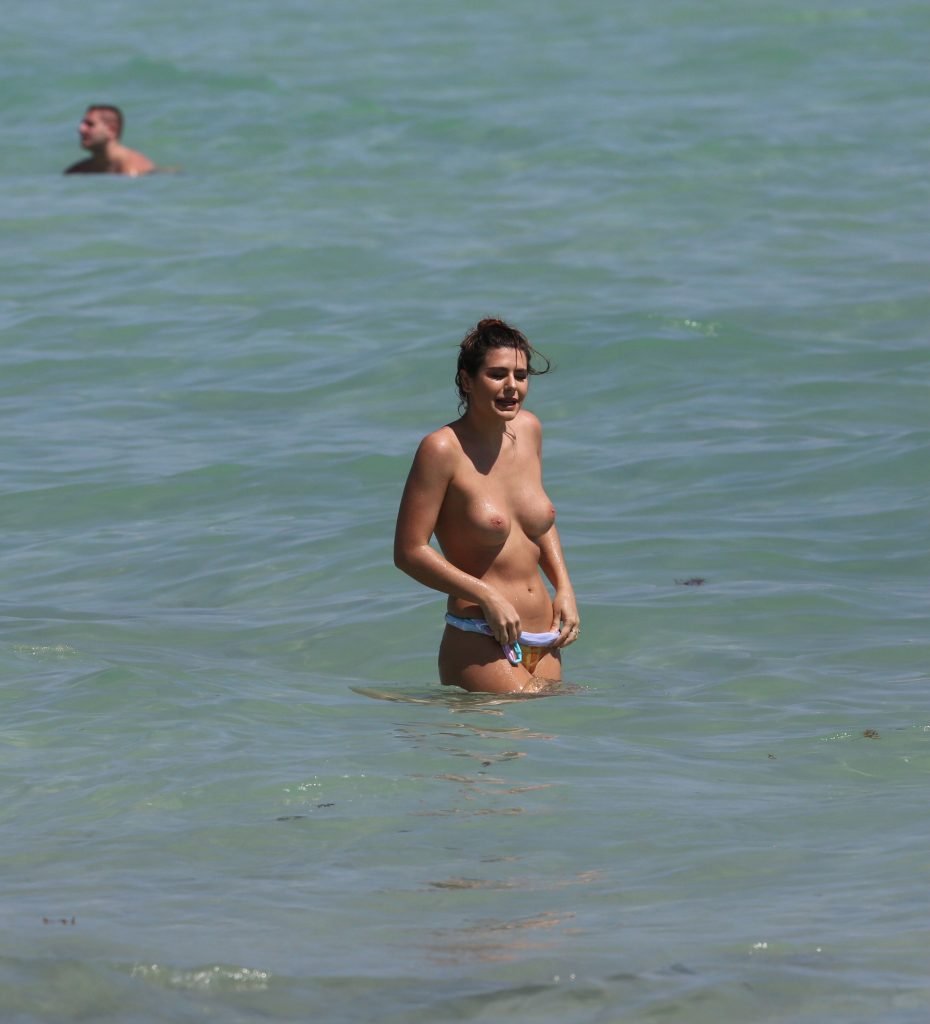 Nima Benati Topless (8 Photos)