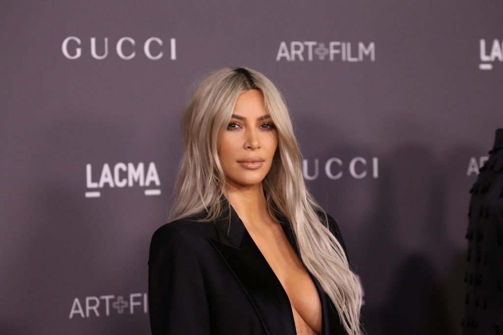 Kim Kardashian Braless (18 Photos + Video)