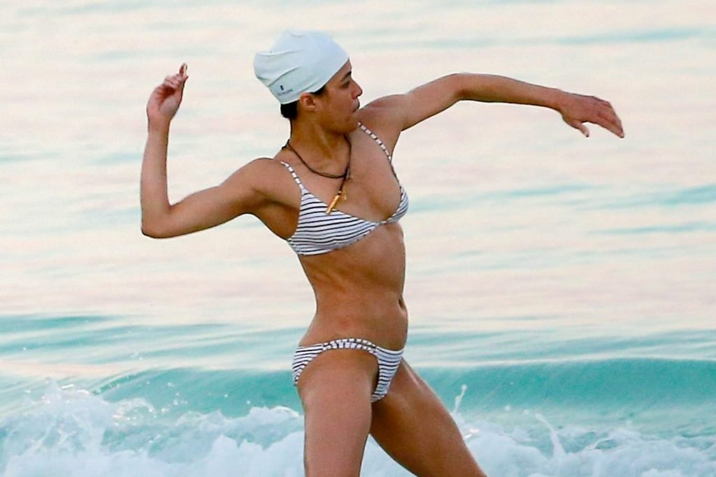 Actress Michelle Rodriguez flashes her nipple on the beach in Tulum, Mexico...
